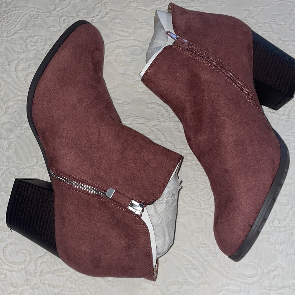 Beautiful plum color bootie. Brand New w/o tags and never worn.